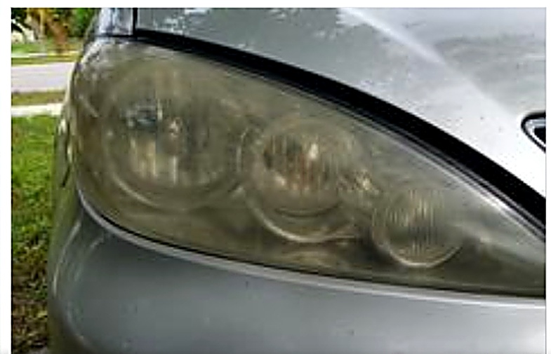 Yellowed, hazy headlight before restoration