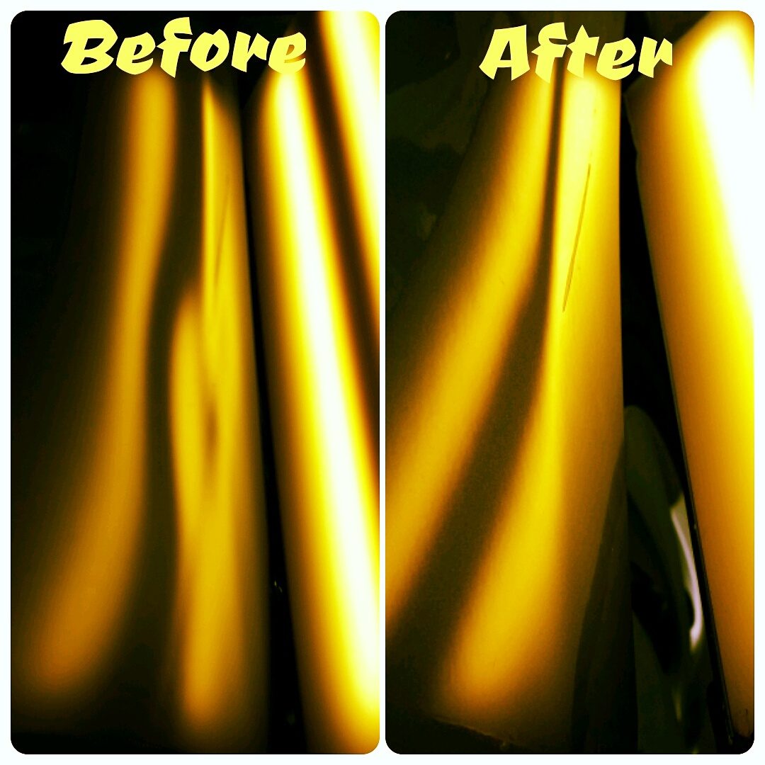 Minor crease taken out of a door panel with paintless repair